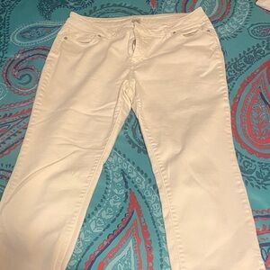 Women's White Jeans has a small tear by waist